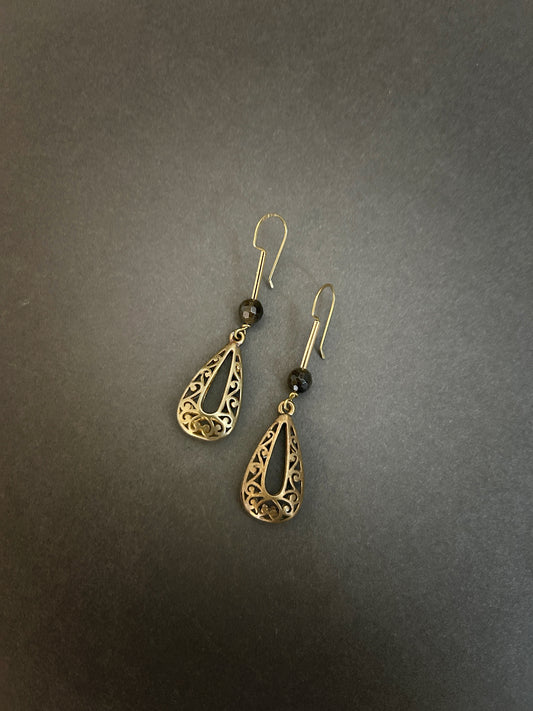 Long filigree brass earrings