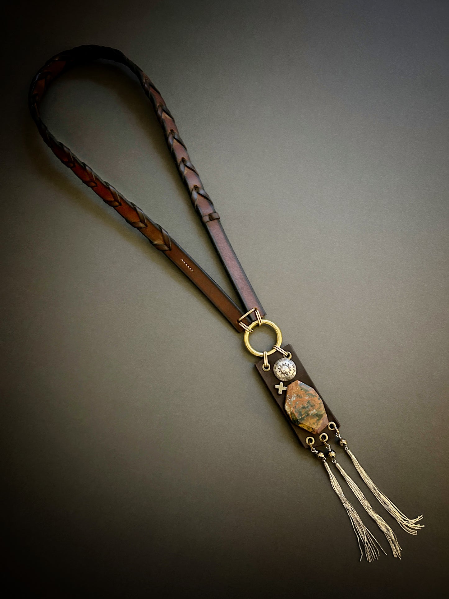 Long laced tack leather necklace with faceted Indonesian agate and silver tassels