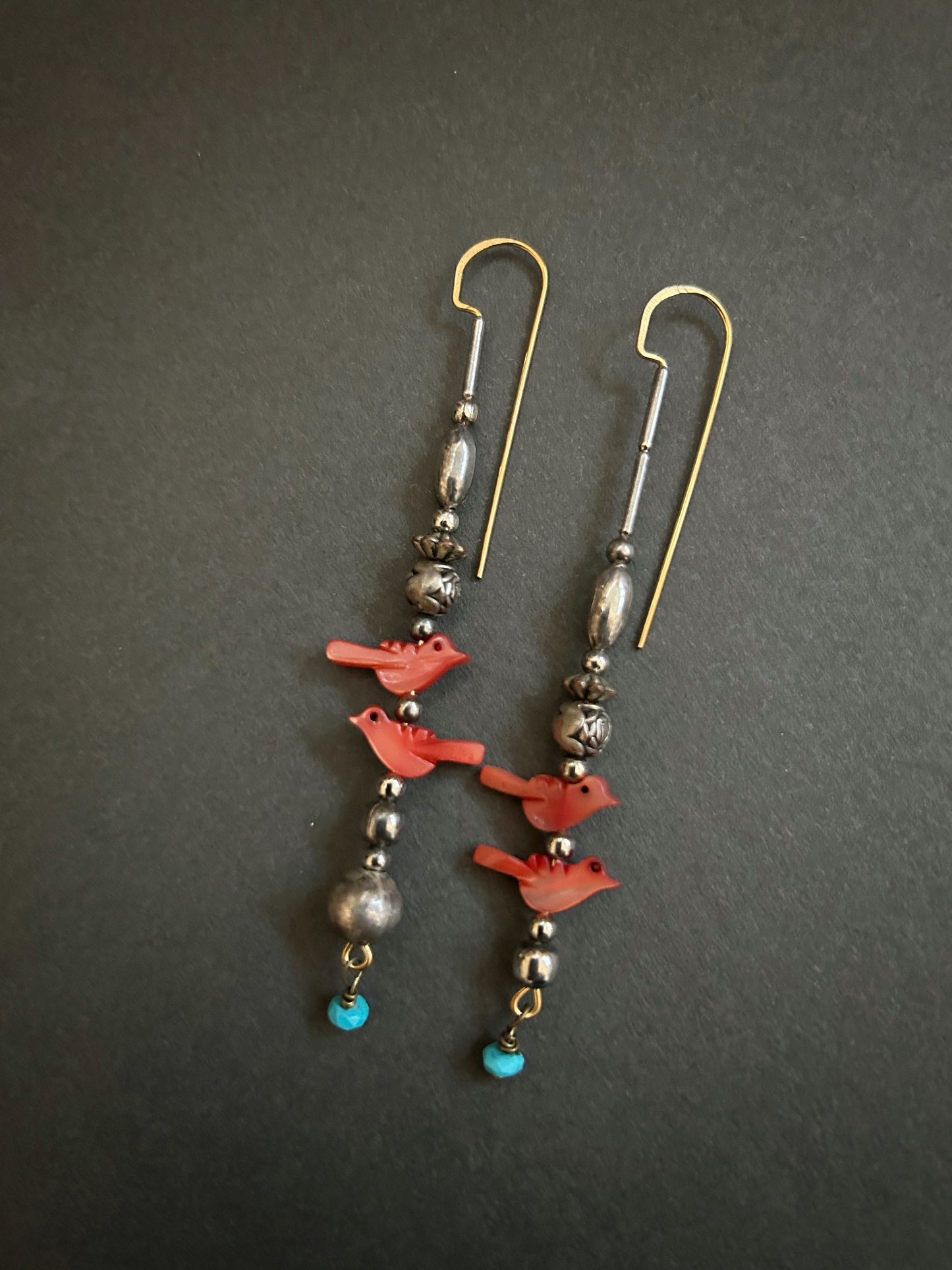 Bird fetish earrings with turquoise