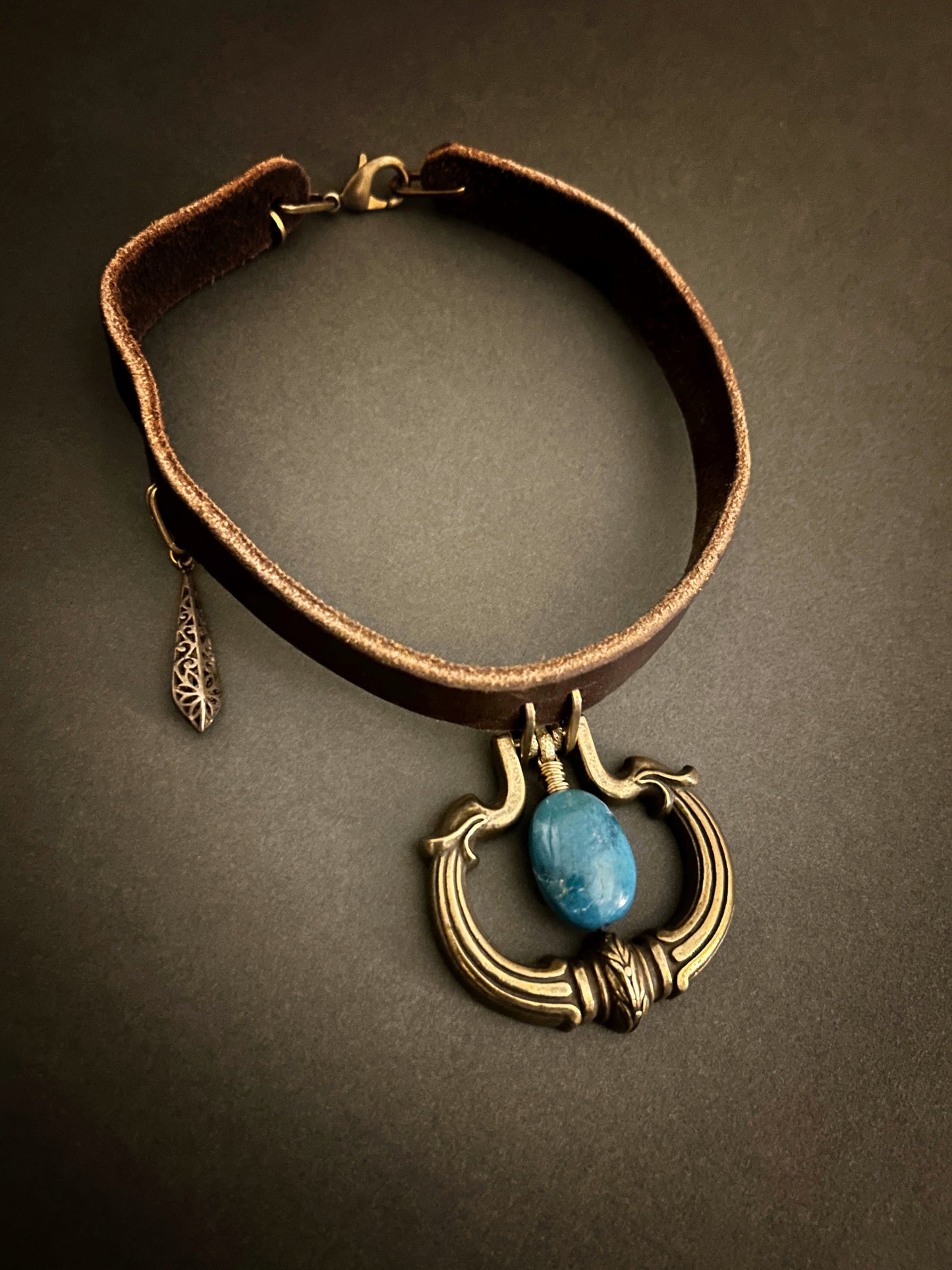 Tack leather necklace with brass hardware and Nacozari turquoise